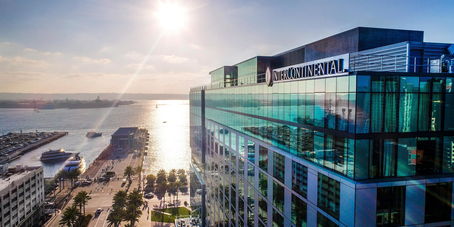 The Seaside InterContinental Hotel under the sunset, looks very luxurious.